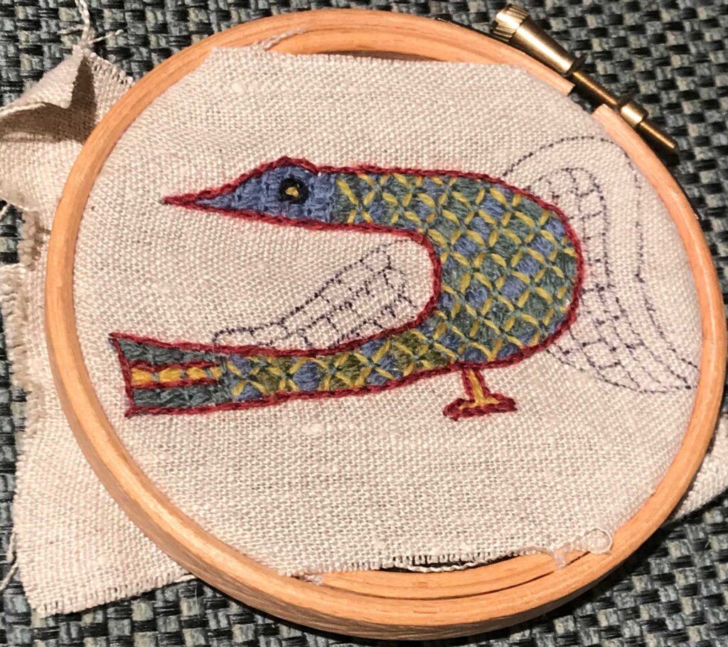 Embroidered bird
