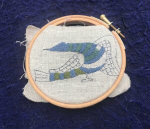 Embroidered bird