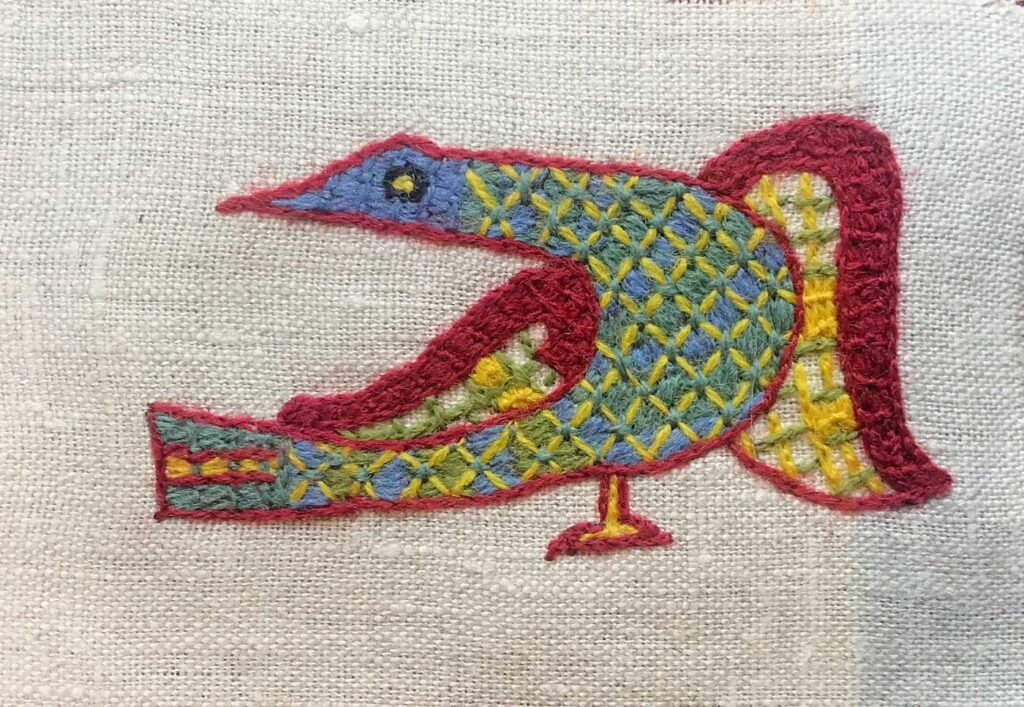 Embroidered bird